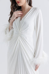 Timeless Elegance: Pleated Gown with Feather Cuffs